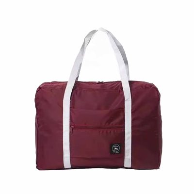 کیف تاشو ضد آب همراه چمدان زرشکی